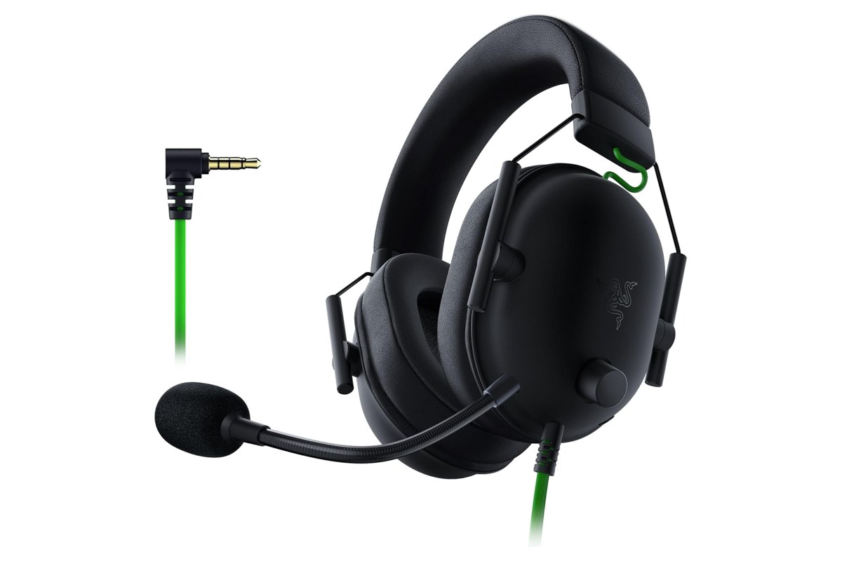 Razer BlackShark V2 X wired gaming headset in black with green cable and detachable foam mic